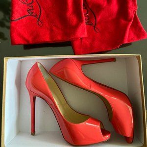 Bright pink peep toe Christian Louboutin Pumps